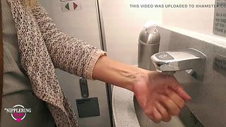 nippleringlover hot milf pissing in public toilet on plane flashing pierced pussy and extreme pierced nipples