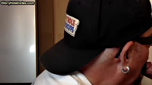 Cock hungry DILF in glory hole sucks cock in homemade closeup