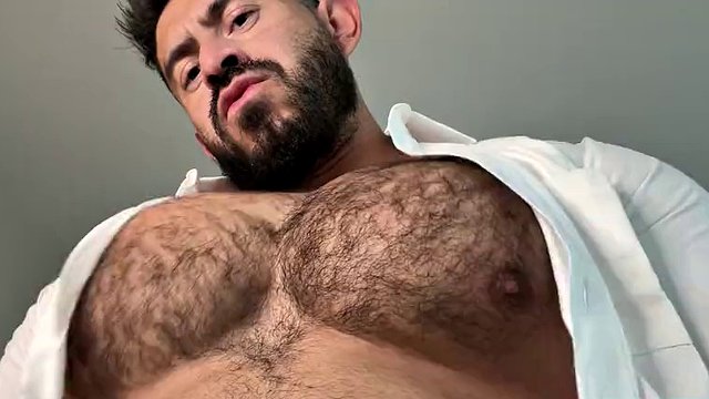 Muscle god rips off his shirt