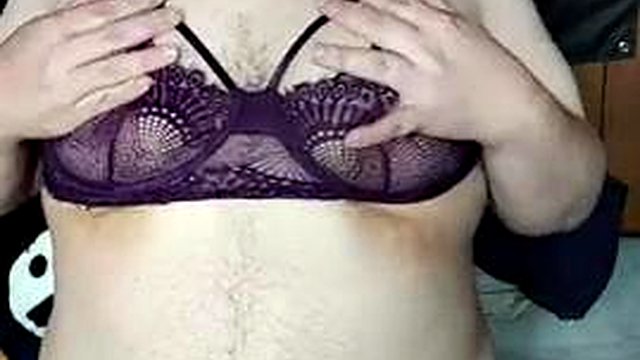 Chubby guy jerks off wearing women's lingerie