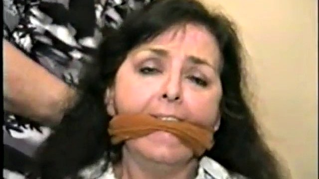 mature woman captured bound and gagged
