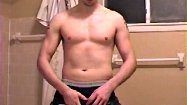 After a busy day, Sean is in the bathroom getting ready to take a shower and decides to play with himself through his pants. He strips and bends over for the camera while stroking his hard cock and soon Sean is pouring a warm load of cum all over his chest.