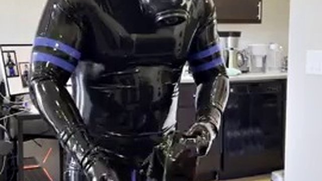 Rubberdrone jerks off in latex socks