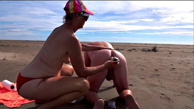 On the beach, I train the ass of my cuckold husband