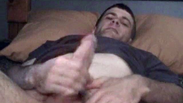 Lying on the bed Johnny massages his cock and balls through his boxers and ends up pulling out a monster boner. He slaps his balls and eats his precum then plays with his ass until he shoots his hot cum on her hairy belly.