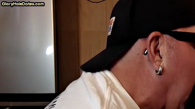Mature gaydaddy sucks cock in homemade gloryhole closeup