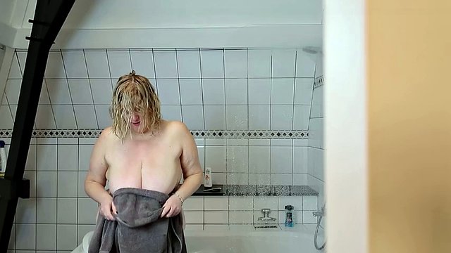 Mature with big tits stepmom fingers herself in the shower