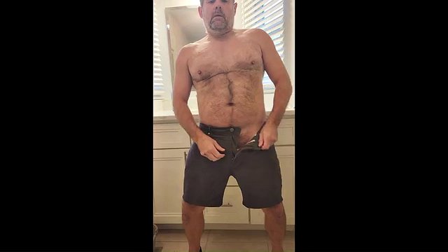 Hairy man strips, plays with toys and blows a huge load
