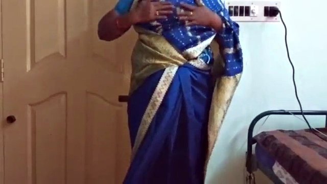 desi north indian horny cheating wife vanitha wearing blue colour saree showing big boobs and shaved pussy press