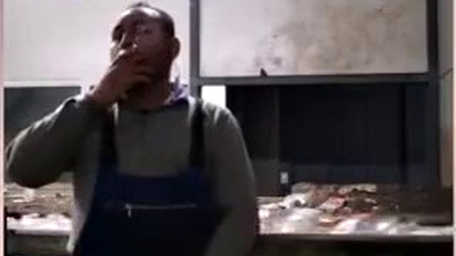 Plump guy smokes and jerks off at work