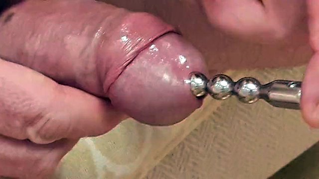 Extreme deep  cock sounding  close up and a cumshot while sounding  rod is fully  inside
