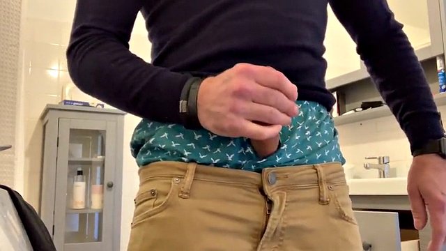 I jerk off my super hard, hard, throbbing cock and cum in the bathroom. I'm hanging out in my American Eagle boxers too