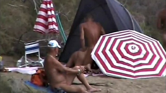 Horny nudist couple on the beach all go out