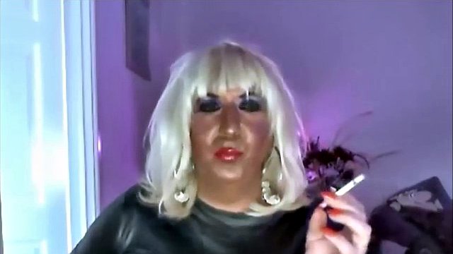 Chrissie smoking and masturbate in black PVC on the Web