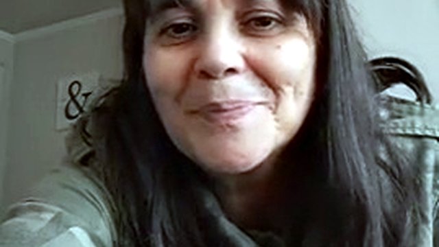 mother-in-law warmly greets her son-in-law's friend
