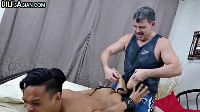Asian twink with small dick fucked bareback by dilf after tickling