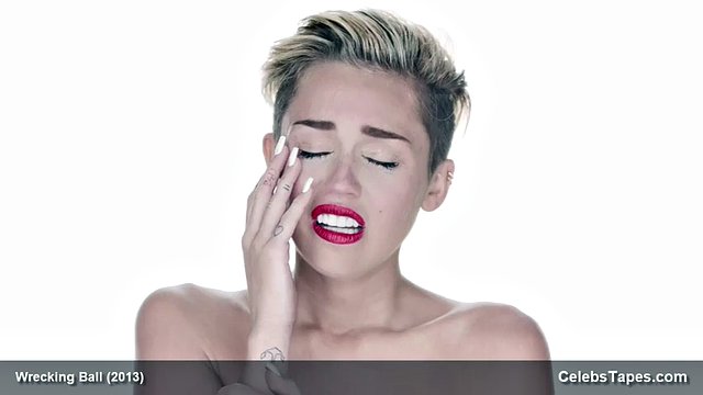 Miley Cyrus completely naked on the ball