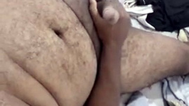 Naked boy in bed ready to cum, big hairy man with big cock touching himself stroking his big black cock, handsome and hot
