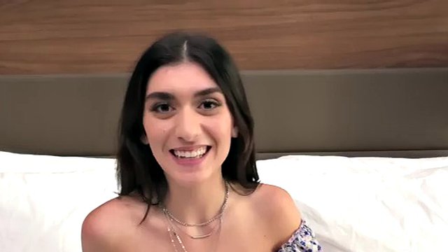 Tall brunette teen with 36DD boobs makes her porn debut