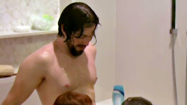 this horny couple is having a sexy swinger threesome while taking a hot shower
