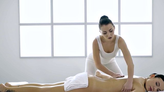 Masseuse licked client's oiled pussy while masturbating with fingers