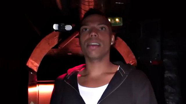 Blindfolded guy in a cage fucks black ass in a gay club