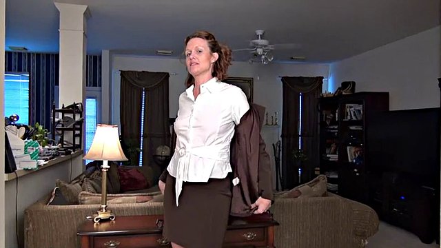 Short-haired MILF with natural boobs fondles her nice cunt