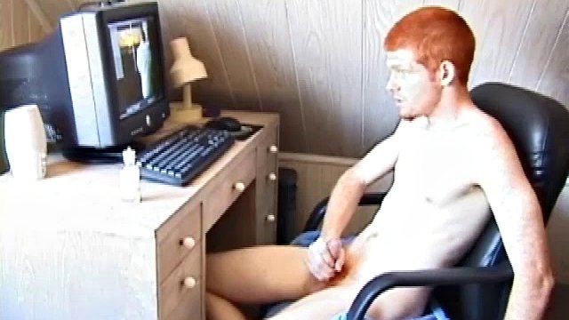 Sitting naked in front of a computer, Tristian lubricates his cock and starts masturbating, while watching some porn. After showing us his cute little ass and stroking himself to the brim, Tristian shoots his hot sticky cum on the computer screen..
