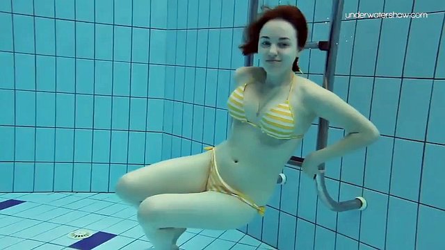 Teen Lada with small tits naked underwater