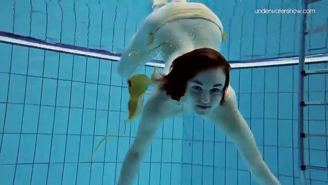 Teen Lada with small tits naked underwater