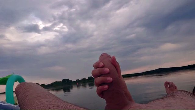 My wife jerks off my dick with a happy ending in the inflatable boat on the lake