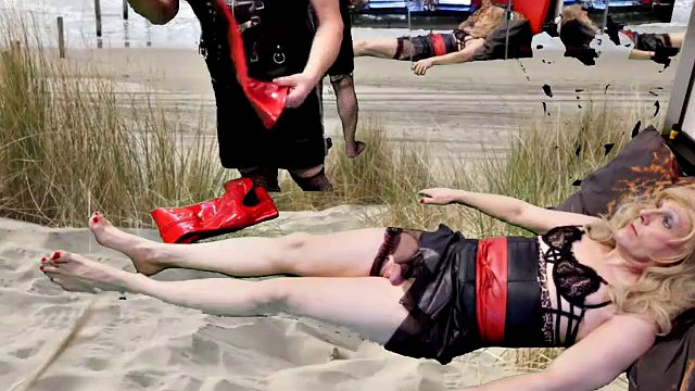 Mistress Samantha punishes her tgirl slave Marina with a good spanking and teases her