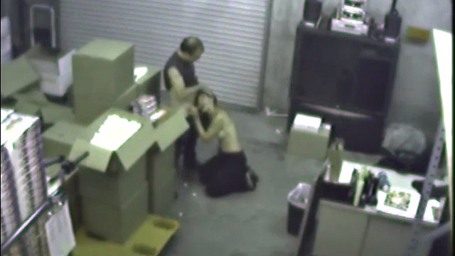 Couple having a blowjob at the warehouse