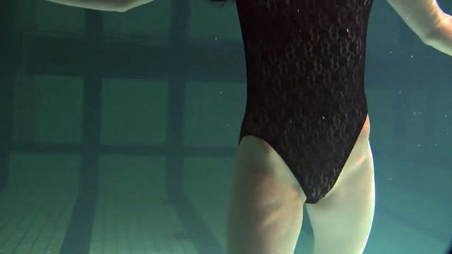 polcharova stipping and enjoying underwater swimming