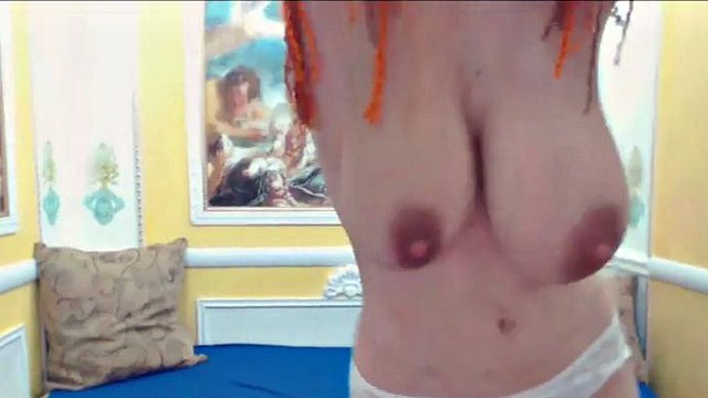 skinny redhead with big natural tits full of milk