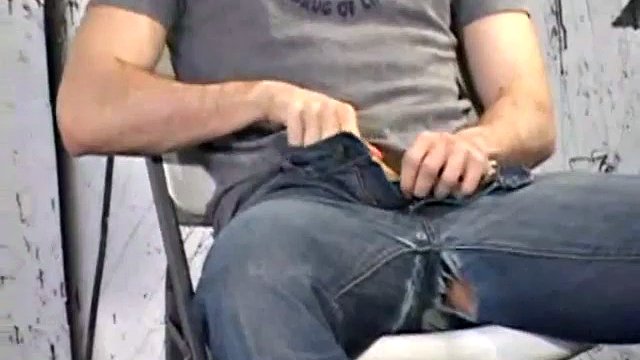 Unbuttoning his jeans, Gabriel Turner pulls out his cock and works hard on this monster meat. A determined hand, some lube and some warm saliva help him pump out a gushing load of cum for us.