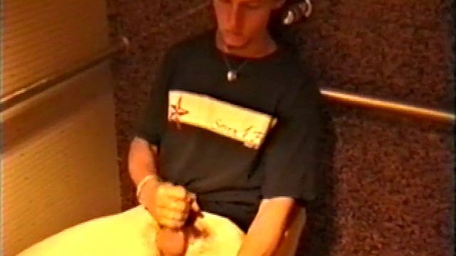 First we watch a shirtless Adam doing some tricks on a skateboard. Then when he gets really turned on, the young man skates into a public restroom where he jerks off in one of the big public booths.
