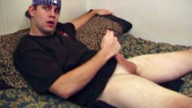 While watching a porn video, young Bobby Drake strokes his stiff cock and then pulls out a rubber dildo to work his ass while he pounds it. It's not long before he's squirting fresh warm cum on his face.