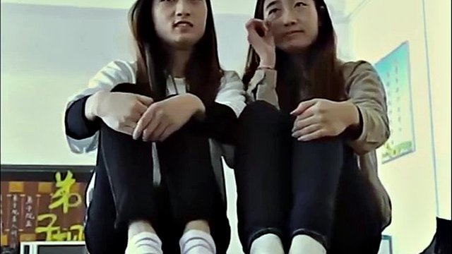 Two Innocent Chinese Girls Show Their Soles