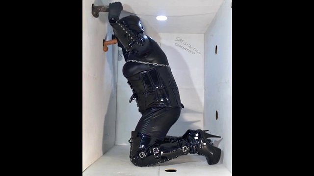 Glory hole fetish slut in boots and PVC services many hard rubber cocks