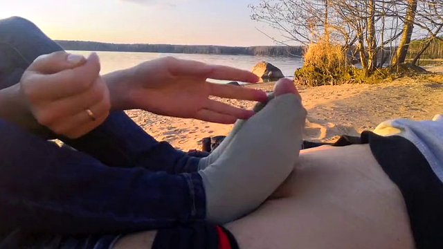 Oxy gave a footjob in a public place by the pond