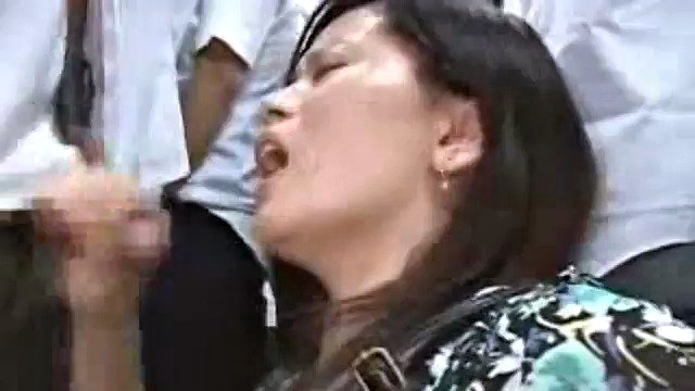 Mature Japanese MILF is groped and fucked in a bus