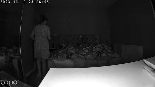 Stepmother comes from the bathroom to her stepson's room