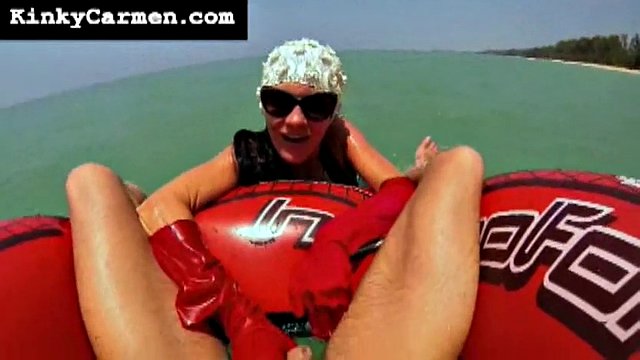 Carmen Rivera gives a tourist an enema with a cane