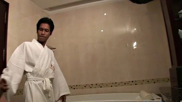 Thin asian shemale gives him a cock massage for bj